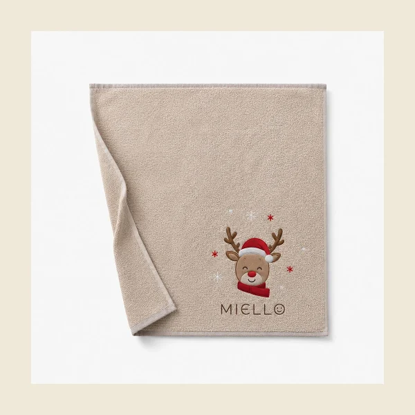 Baby towel in soft beige cotton with an embroidered reindeer motif
