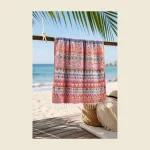 Custom embroidered peshtemal in a multicolour Anatolian pattern with hand-knotted tassels