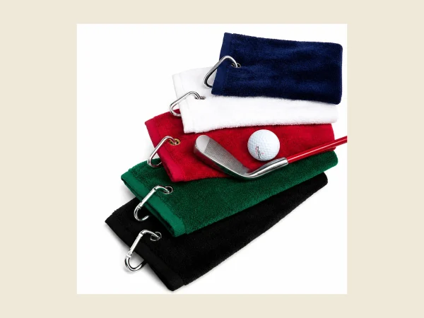 Stack of golf towels in navy red white green and black with metal carabiner hooks