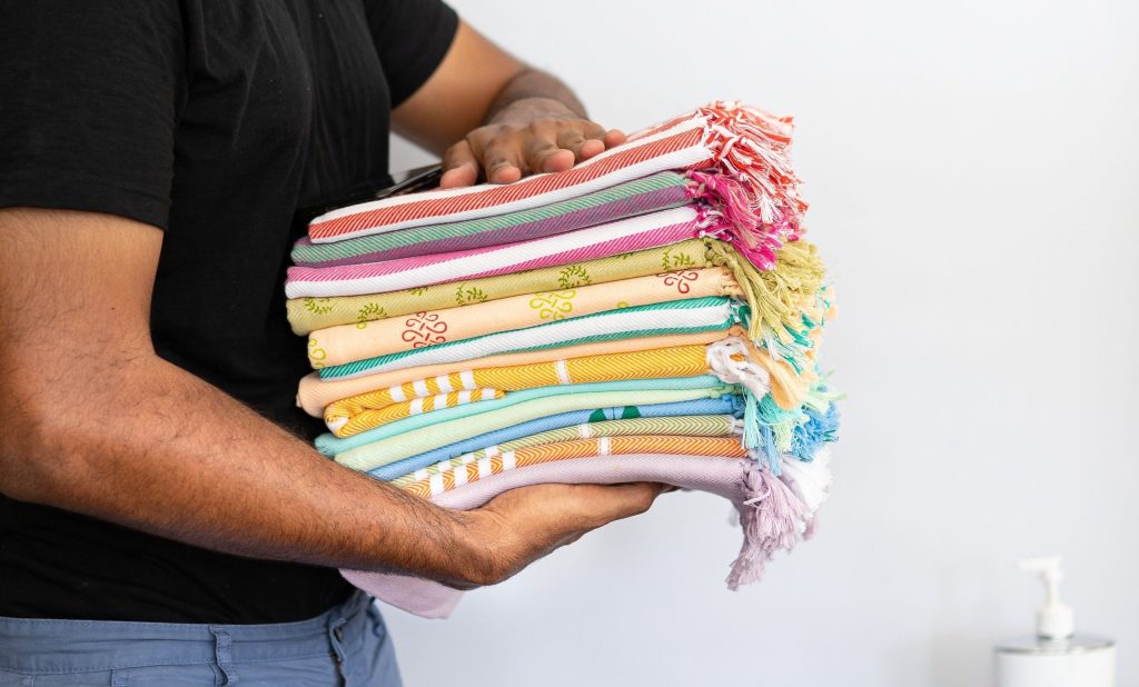 Velour pool towels in a resort pool setting
