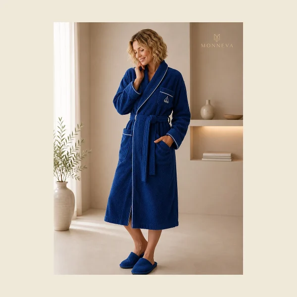 Navy terry bathrobe with piped shawl collar and MONNEVA embroidery — classic hotel weight